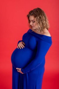 EsteemBoudoir-Atlanta-Phoenix-Boudoir-Photographer-maternity-baby-bump-blue-dress-red-background2